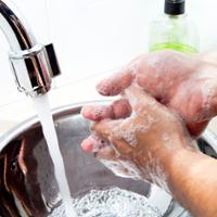 person washing their hands